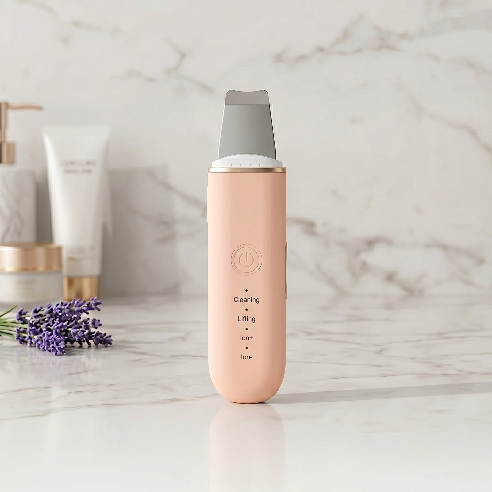 pink skincare device on a marble surface with lavender flowers and cream bottles in the background