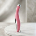 Pink mini eye massager with heat and vibration therapy.